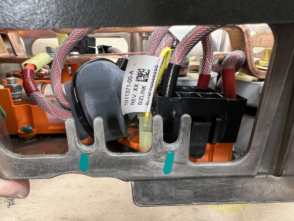 Tesla Model S GEN1 Rear HVJB: (3) parked connectors for Second/Slave OBC: HVIL Loopback Harness (yellow wire), and AC/DC Connectors (to the right).